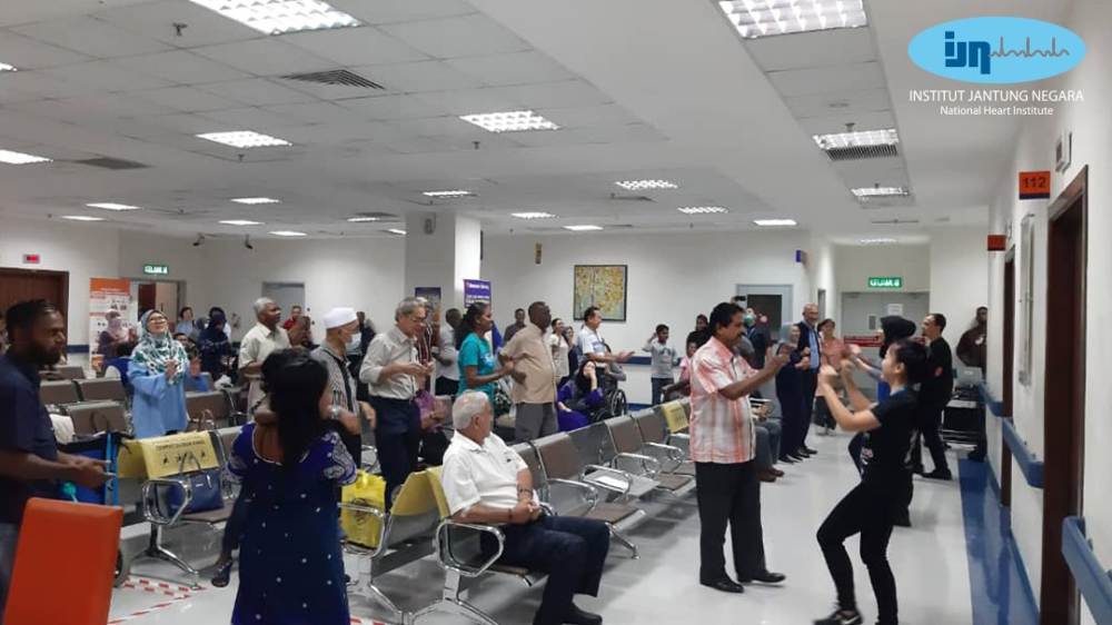 Outpatients engaging in simple exercises to pass the time in IJNu00e2u20acu2122s waiting room. u00e2u20acu201d Picture via Facebook/IJN.Malaysia