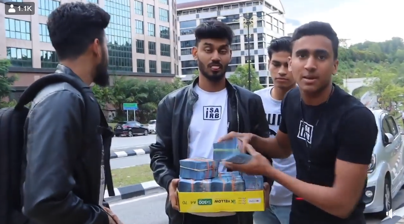 Social media users slammed Isa's (right) antics, saying he was being disrespectful. u00e2u20acu201d Facebook screengrab