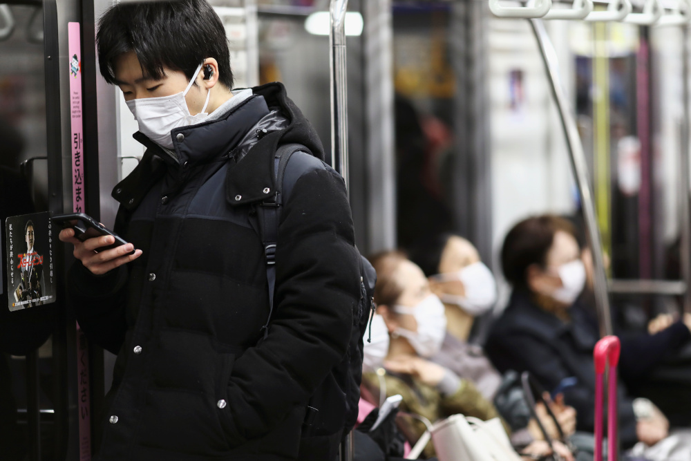 Passengers wearing protective face masks are seen as they ride on a train in Tokyo, Japan, February 14, 2020. u00e2u20acu201d Reuters pic 