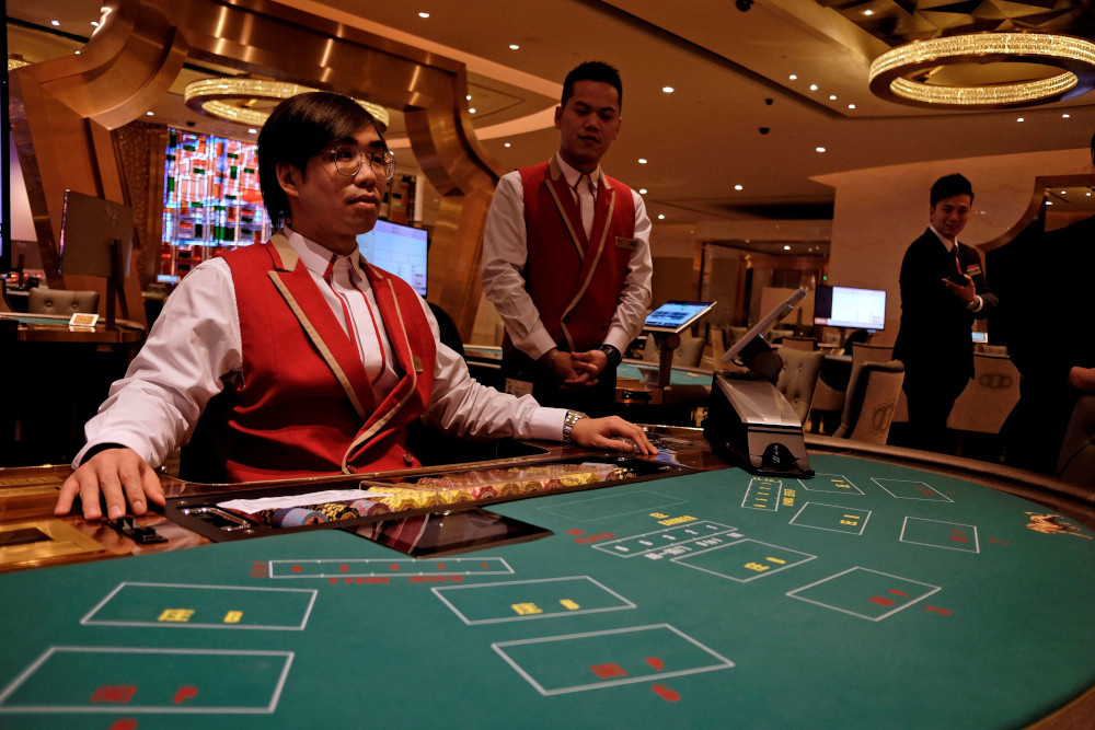 Employees inside the casino prepare for the opening of MGM Cotai in Macau, China February 13, 2018. u00e2u20acu201d Reuters pic
