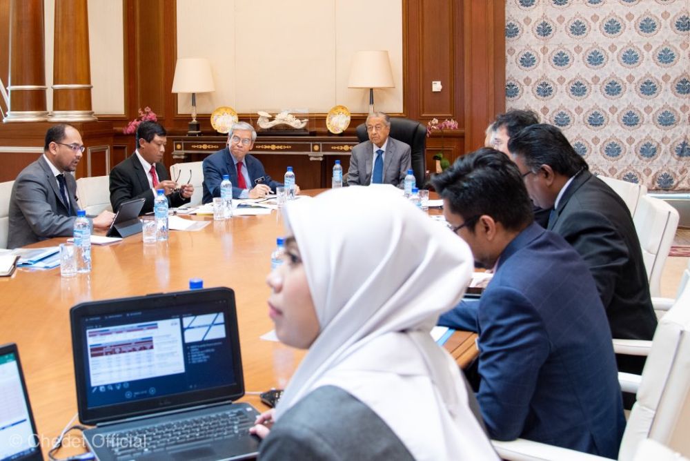 Interim prime minister Tun Dr Mahathir Mohamad chairs a meeting with Finance Ministry officials on the Covid-19 economic stimulus package in Putrajaya February 26, 2020. u00e2u20acu201d Picture via Twitter