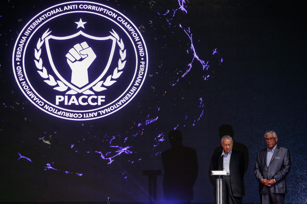 Prime Minister Tun Dr Mahathir Mohamad and GIACC director Tan Sri Abu Kassim Mohamed during the launch of the International Anti-Corruption Champion Foundation (PIACCF) in Putrajaya February 11, 2020. u00e2u20acu201d Picture by Hari Anggara