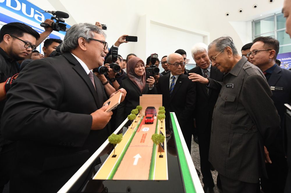 Prime Minister Tun Dr Mahathir Mohamad visits a booth after launching National Automotive Policy 2020 at Menara Miti, Kuala Lumpur February 21, 2020. u00e2u20acu201d Bernama pic
