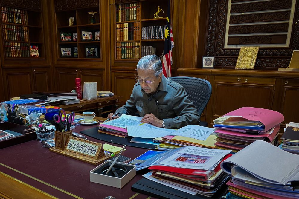 Interim prime minister Tun Dr Mahathir Mohamad gets down to business at Perdana Putra February 25, 2020. u00e2u20acu201d Picture via Twitter