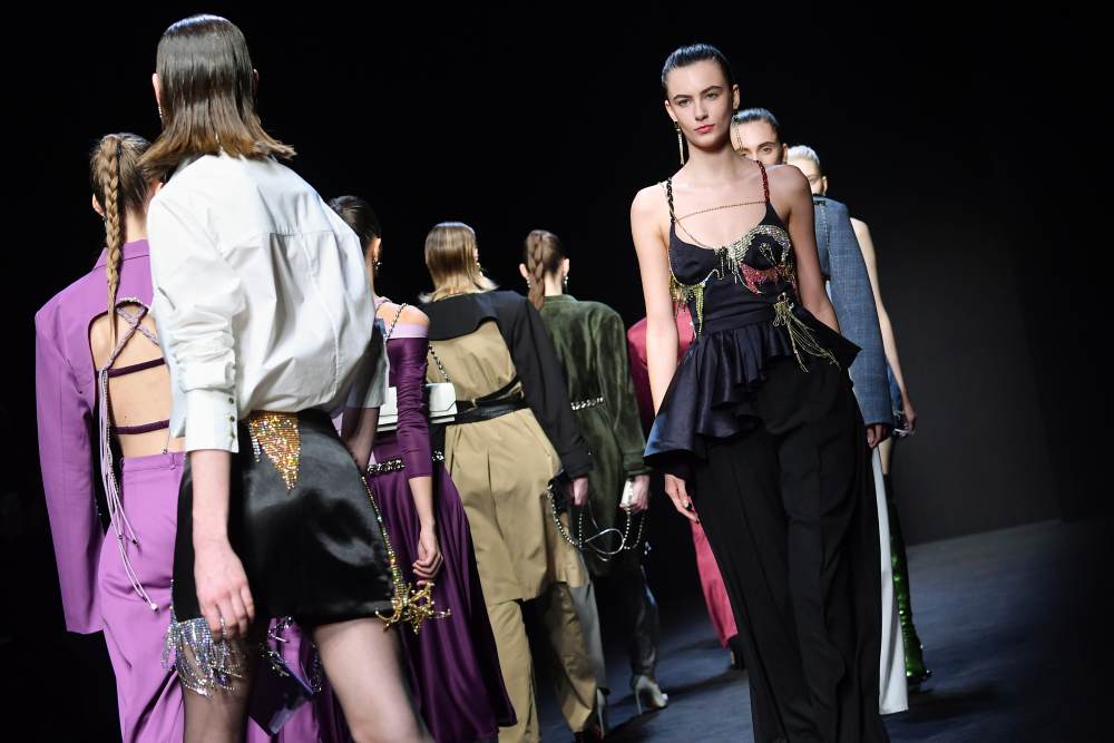 Models present creations for Chinese designer Han Wen's Fall-Winter 2020 collection, as part of the u00e2u20acu02dcChina, We are With Youu00e2u20acu2122 fashion event, kicking off the fashion week in Milan on February 18, 2020. u00e2u20acu2022 AFP pic