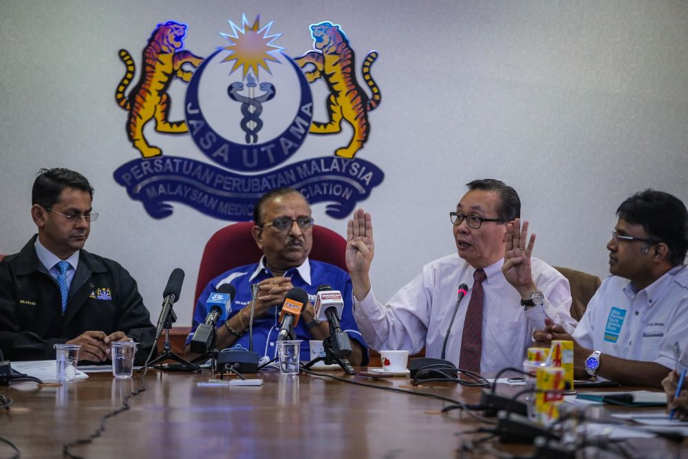 Former Health Ministry deputy director-general Datuk Dr Christopher Lee speaks during a press conference in Kuala Lumpur February 21, 2020. u00e2u20acu201d Picture by Hari Anggara