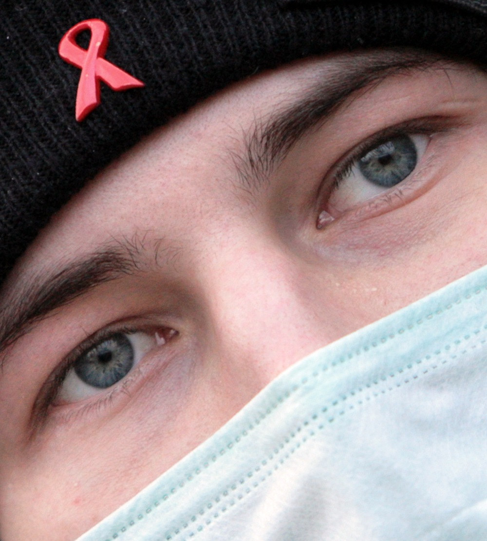 In this file photo taken on November 28, 2006 a FrontAIDS activist with a Red Ribbon, a sign of support for people living with HIV, on his cap protests in downtown Moscow. u00e2u20acu201d AFP pic 