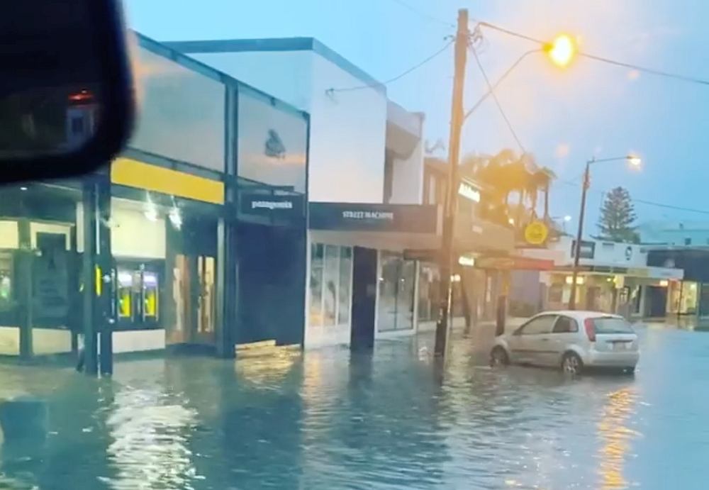 A car stands on a flooded street in Byron Bay, New South Wales, Australia, February 7, 2020. u00e2u20acu201d Ballina Surf/social media screenshot via Reuters