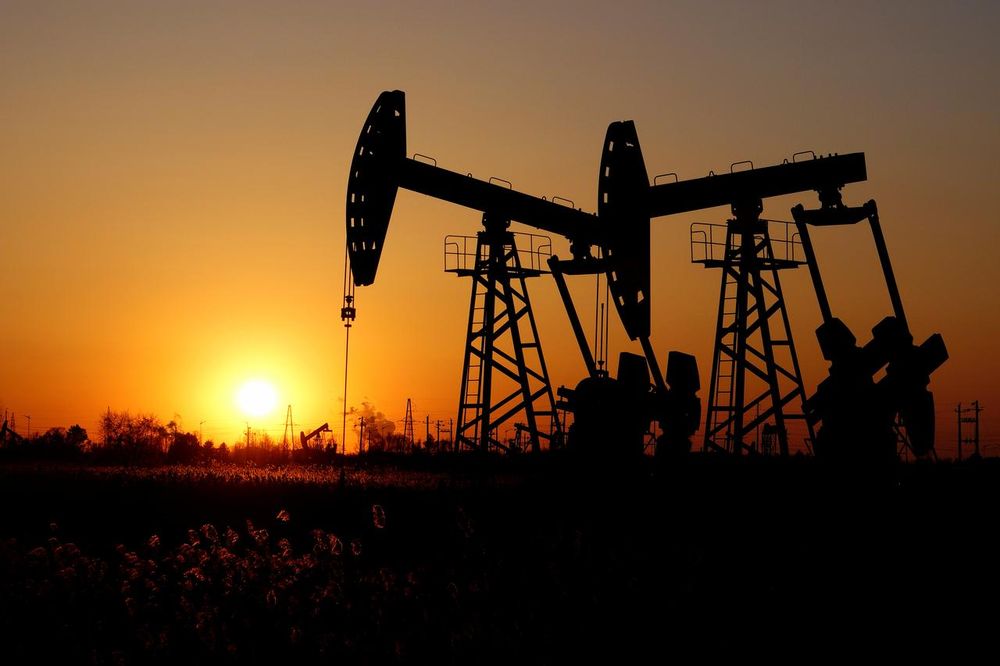 Pumpjacks are seen against the setting sun at the Daqing oil field in Heilongjiang province, China December 7, 2018. u00e2u20acu201d Reuters pic