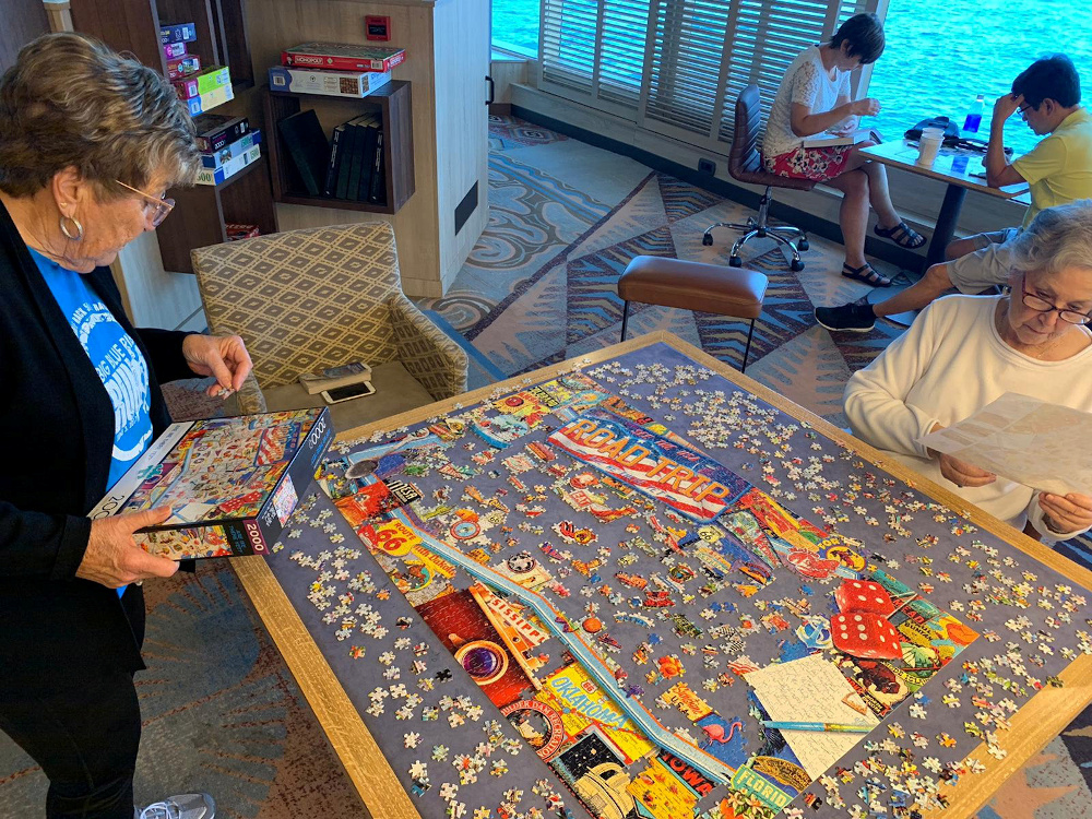 Passengers relax on board the Holland America-operated Westerdam cruise ship, which has been denied permission to dock in Thailand over coronavirus fears, February 12, 2020. u00e2u20acu201d Picture by Maria Angus/Handout via Reuters