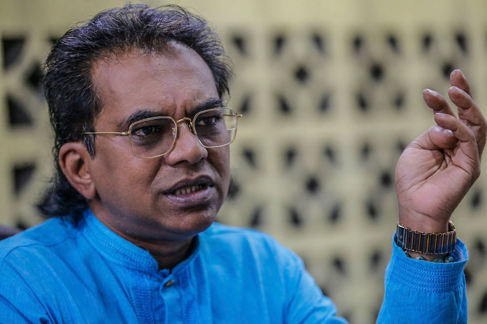 Samuel Dass has learned a few tricks on other instruments, thanks to his wide range of musician friends. — Picture by Hari Anggara