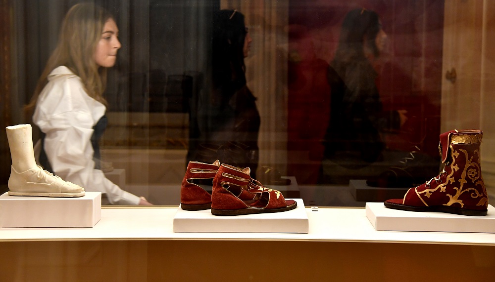 A visitor views sandals during the exhibition u00e2u20acu02dcWorn by the Godsu00e2u20acu2122 at the Fashion and Costume Museum in Palazzo Pitti in Florence January 30, 2020. u00e2u20acu201d AFP pic