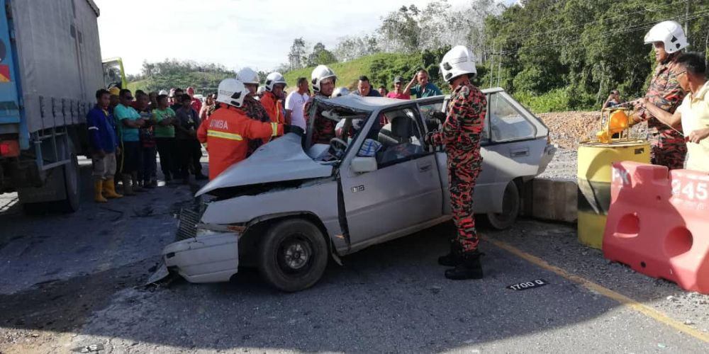 The damaged car after a head-on collision with a truck laden with medical waste in Saratok, February 6, 2020. u00e2u20acu201d Picture courtesy of the Saratok Fire and Rescue Department 