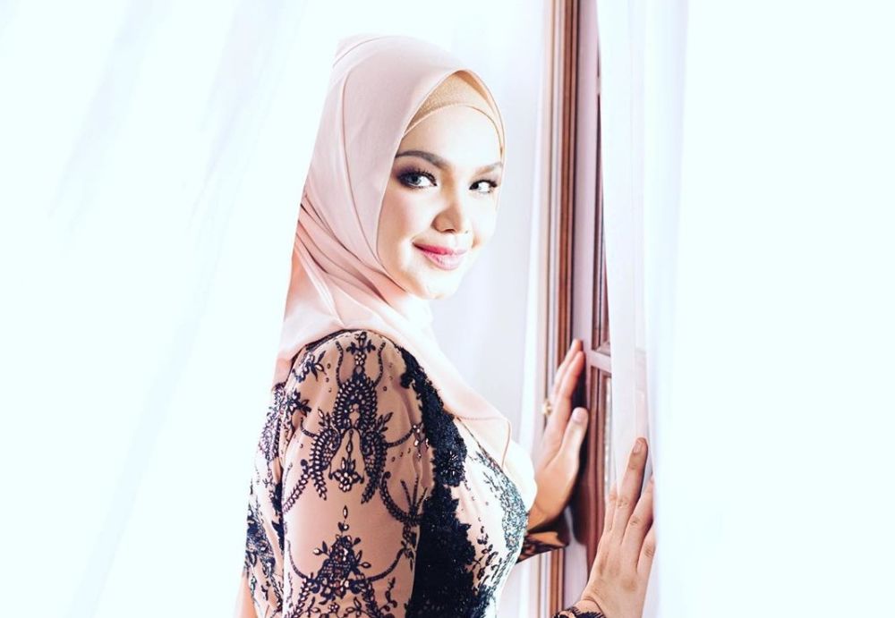 Siti Nurhaliza has expressed disappointment after a few individuals reuploaded her newly-released single on YouTube. u00e2u20acu201d Picture via Instagram 