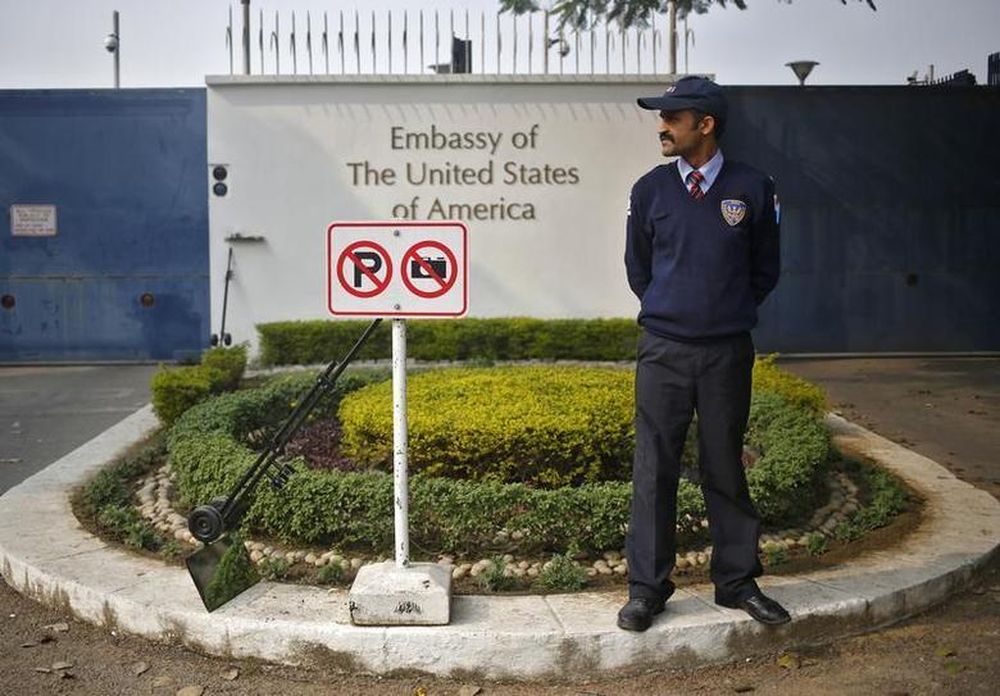 A private security guard stands outside the US embassy in New Delhi December 18, 2013. u00e2u20acu201d Reuters pic