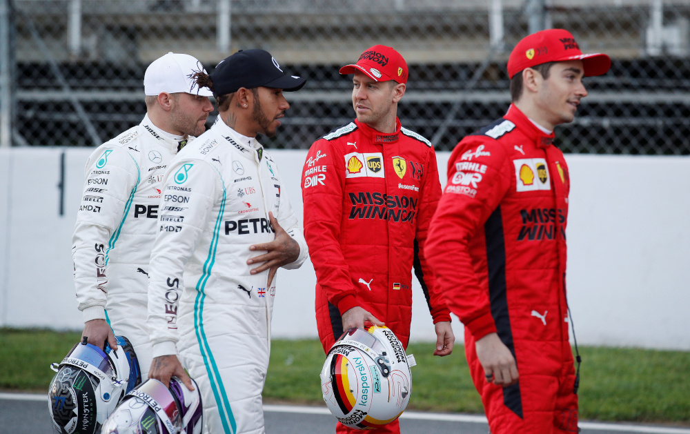 Ferrariu00e2u20acu2122s Sebastian Vettel speaks to Mercedesu00e2u20acu2122 Valtteri Bottas and Lewis Hamilton alongside Ferrariu00e2u20acu2122s Charles Leclerc before testing at the Circuit de Barcelona in Catalunya, Spain February 19, 2020. u00e2u20acu201d Reuters pic 
