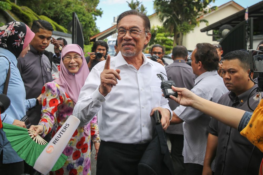 Datuk Seri Anwar Ibrahim speaks to reporters gathered outside his residence in Kuala Lumpur February 26, 2020. u00e2u20acu201d Picture by Yusof Mat Isa