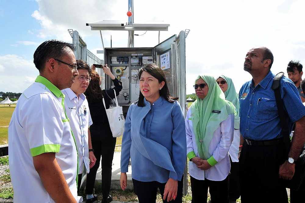 Energy, Science, Technology, Environment and Climate Change Minister Yeo Bee Yin (centre) tests the early warning pollution monitoring system in Pasir Gudang February 23, 2020. u00e2u20acu201d Picture by Ben Tan