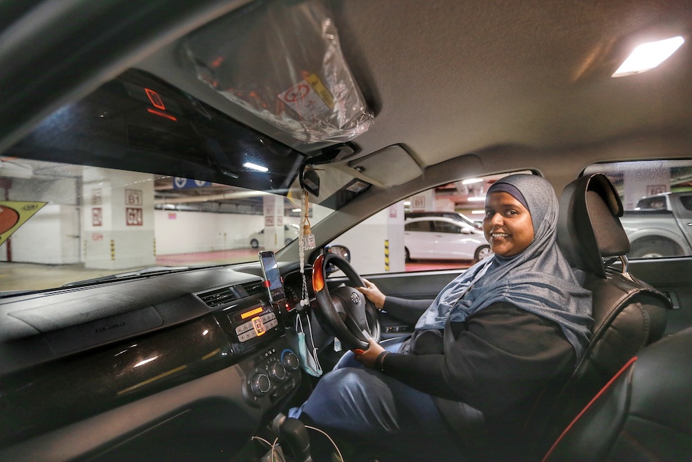 Noorain has been making a living as a Grab driver since January 2019. u00e2u20acu201d Picture by Ahmad Zamzahuri