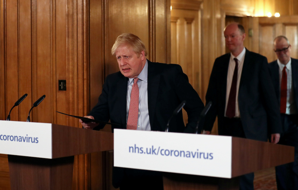 British Prime Minister Boris Johnson arrives to hold a news conference addressing the government's response to the coronavirus outbreak, at Downing Street in London March 12, 2020. u00e2u20acu201d Reuters pic