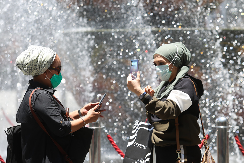 Tourists are seen wearing masks along Jalan Bukit Bintang, Kuala Lumpur March 16 2020. u00e2u20acu201d Picture by Choo Choy May