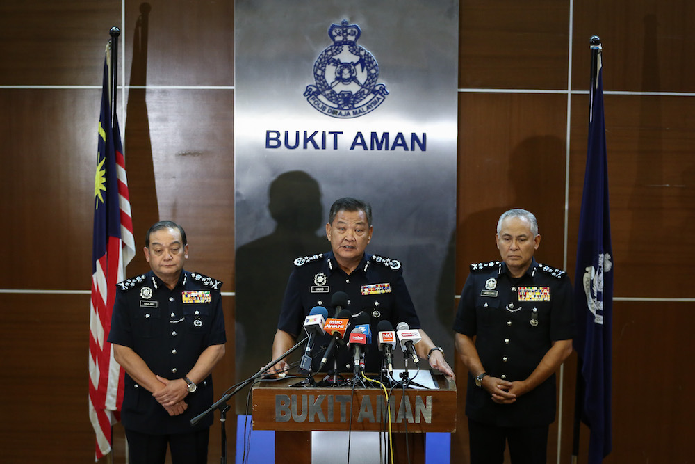 Inspector-General of Police (IGP) Tan Sri Abdul Hamid Bador (centre) speaks during a press conference in Kuala Lumpur March 17, 2020. u00e2u20acu201d Picture by Yusof Mat Isa