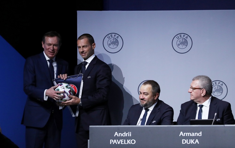 Dutch minister for medical care and sport Bruno Bruins poses as he receives a football with Uefa President Aleksander Ceferin during the Uefa Congress in Amsterdam March 3, 2020. u00e2u20acu201d Reuters pic