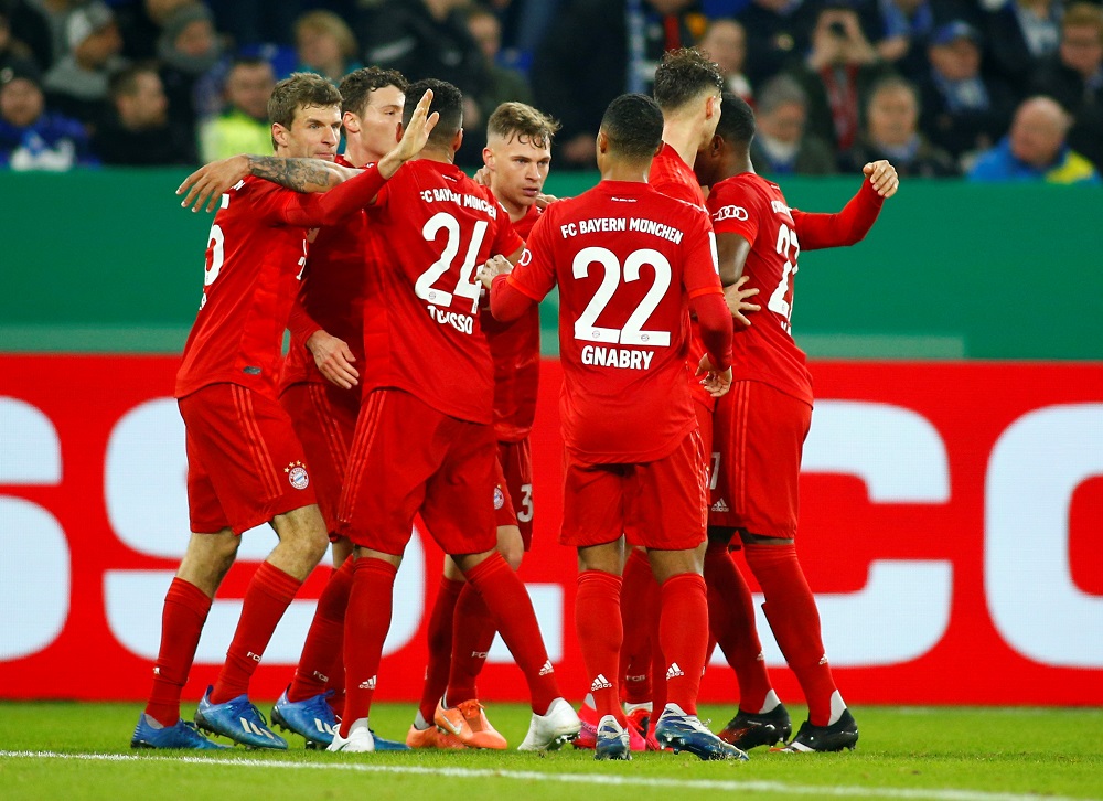 Bayern Munich's Joshua Kimmich celebrates scoring their first goal with teammates at the Veltins-Arena in Gelsenkirchen, Germany March 3, 2020. u00e2u20acu201d Reuters pic