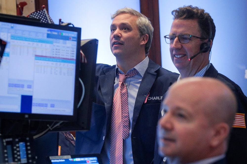 Traders work on the floor at the New York Stock Exchange March 4, 2020. u00e2u20acu201d Reuters pic