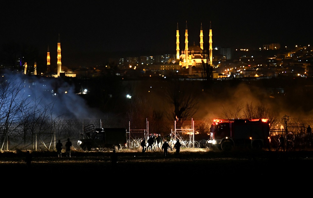 Greek riot police stand guard next to the border fence, near Greeceu00e2u20acu2122s Kastanies border crossing with Turkeyu00e2u20acu2122s Pazarkule, as the city of Edirne is seen in the background, in Kastanies, Greece March 6, 2020. u00e2u20acu201d Reuters pic
