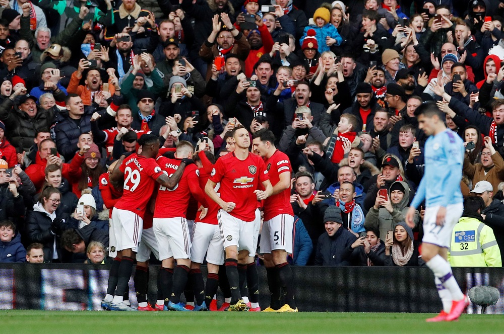 Manchester United's Anthony Martial celebrates scoring their first goal with teammates at the Old Trafford in Manchester March 8, 2020. u00e2u20acu201d Reuters pic