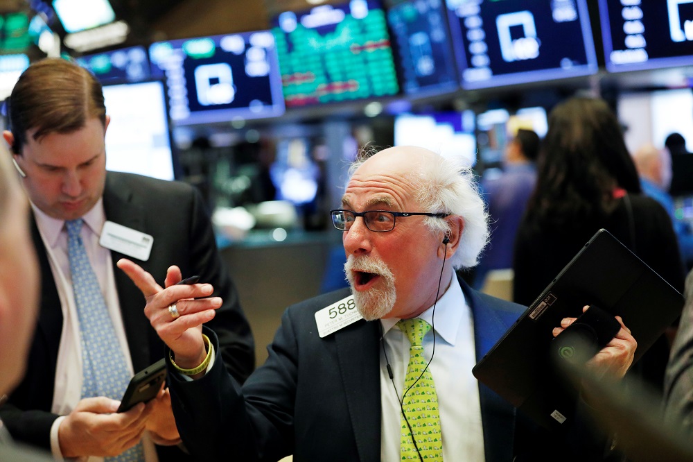 Traders work on the floor of the New York Stock Exchange March 11, 2020. u00e2u20acu201d Reuters pic