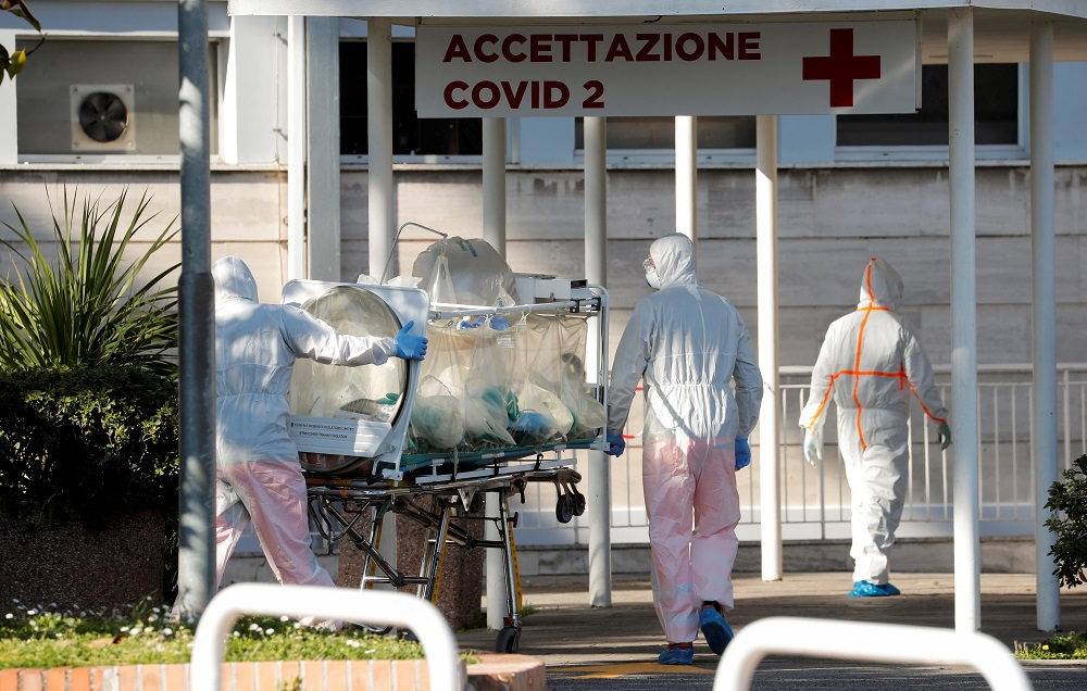 Medical workers in protective suits push an isolation stretcher in front of the Columbus Clinic, where patients suffering from coronavirus disease were moved from Spallanzani Hospital, in Rome March 16, 2020. u00e2u20acu201d Reuters pic