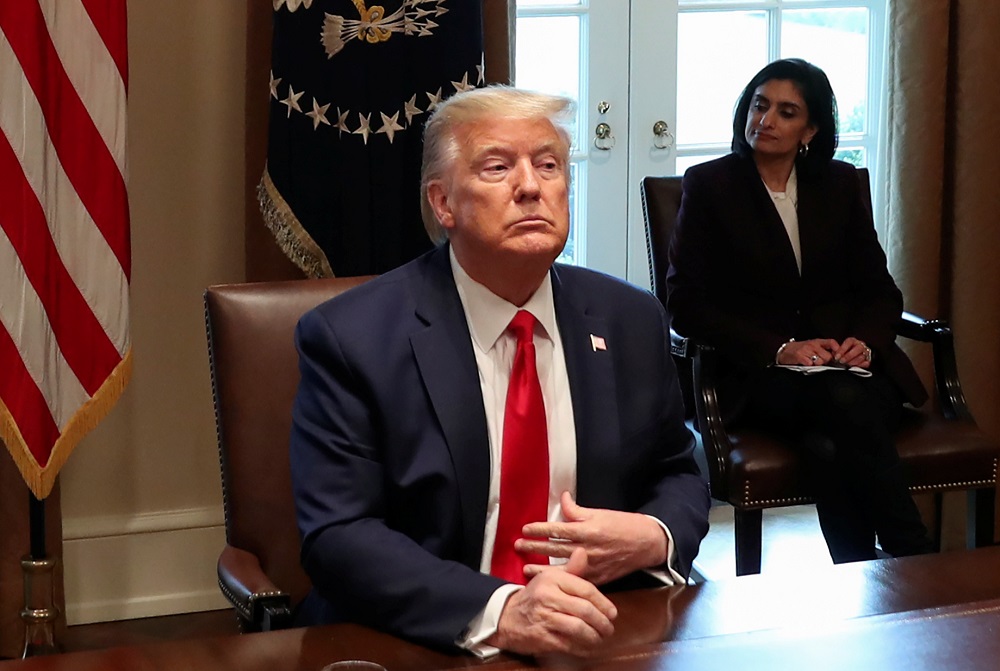 US President Donald Trump meets with representatives of nurses organizations on coronavirus response as Seema Verma, administrator of the Centres for Medicare & Medicaid Services, listens in the Cabinet Room of the White House in Washington March 18, 2020