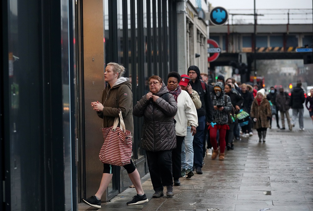 People queue outside of an Aldi store, as the spread of the coronavirus disease continues in London March 19, 2020. u00e2u20acu201d Reuters pic