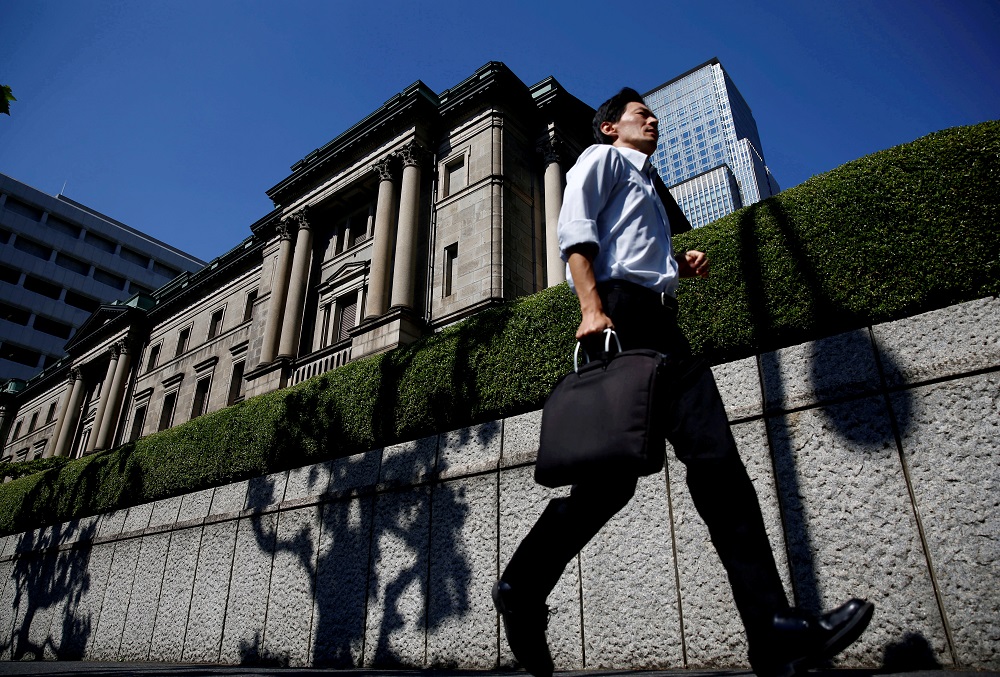 A man runs past the Bank of Japan building in Tokyo, Japan, July 29, 2016. u00e2u20acu201d Reuters pic