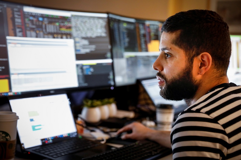 NYSE-AMEX Options floor trader Luis from TradeMas Incworks in an off-site trading office built when the New York Stock Exchange closed, due to the outbreak of the coronavirus disease in New York March 26, 2020. u00e2u20acu201d Reuters pic