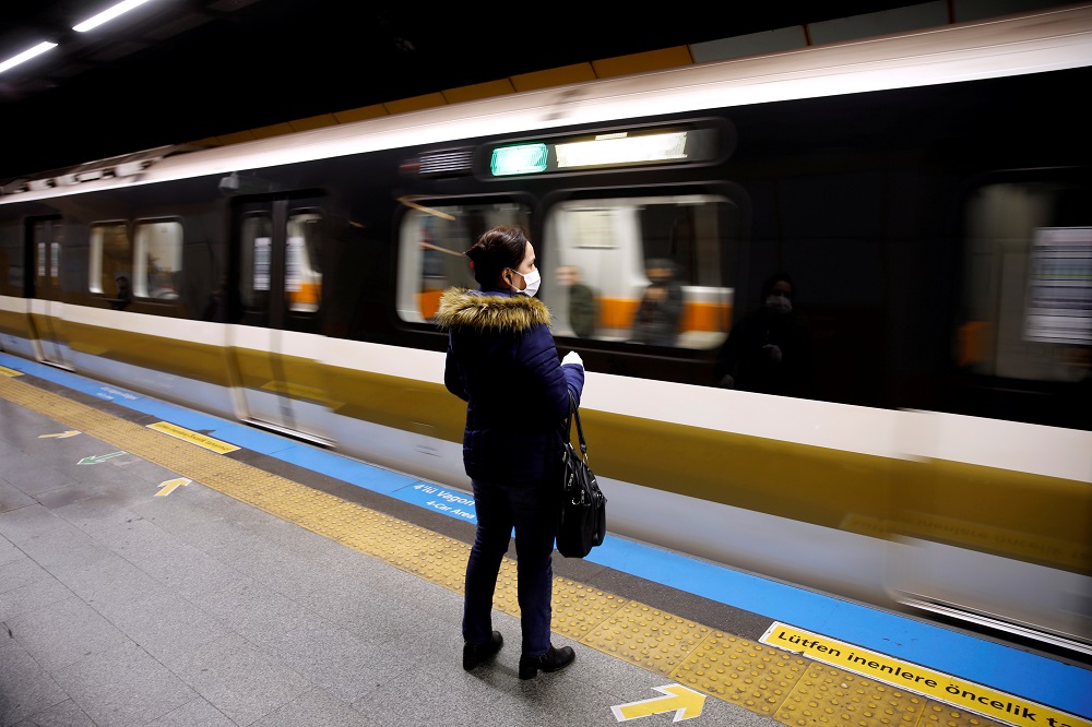 A woman wearing a protective face mask waits for a train as the spread of the coronavirus disease continues in Istanbul March 26, 2020.  u00e2u20acu201d Reuters pic