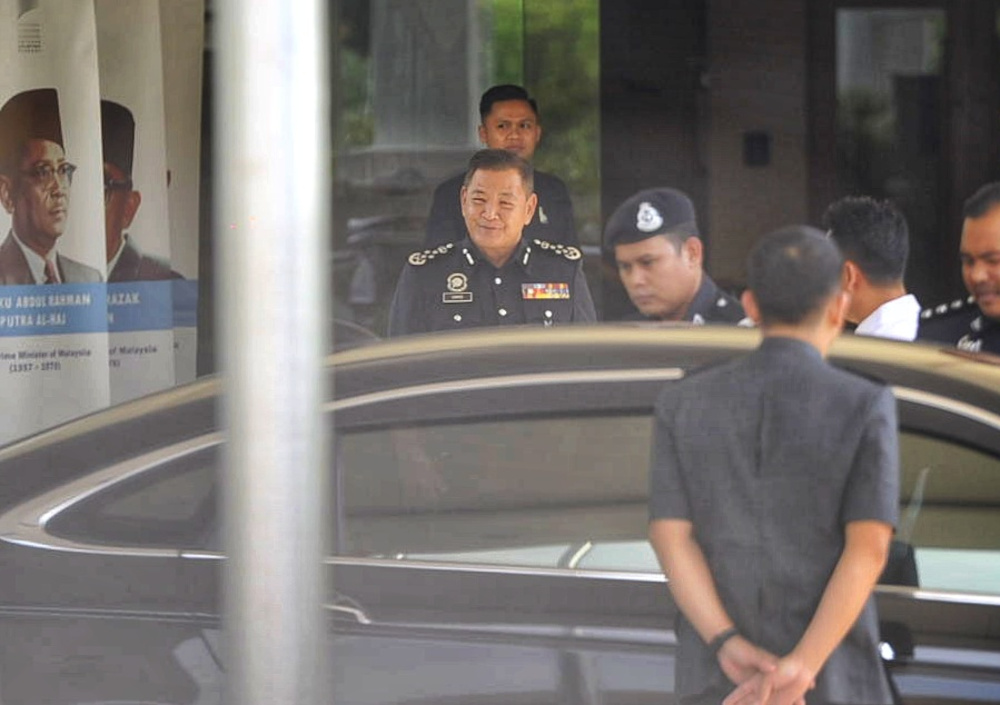 Inspector General Police Datuk Seri Hamid Bador leaves the Perdana Leadership Foundation in Putrajaya, March 2, 2020 u00e2u20acu201d Picture by Shafwan Zaidon  