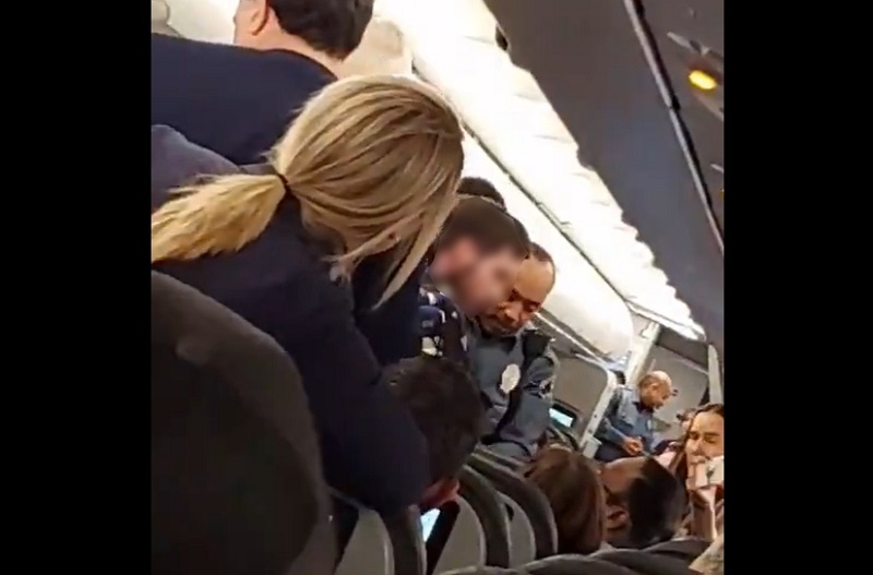 A man was forced off the plane by other passengers and flight crew. u00e2u20acu201c Screengrab via Twitter/KingFazir