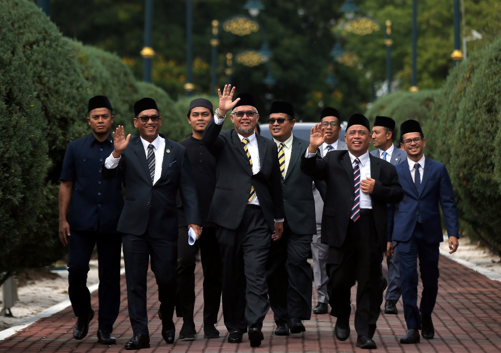 Datuk Seri Ahmad Faizal Azumu, Razman Zakaria and Datuk Saarani Mohamad leave Istana Kinta after an audience with the Sultan of Perak Sultan Nazrin Muizzuddin Shah March 12, 2020. u00e2u20acu201d Picture by Farhan Najib