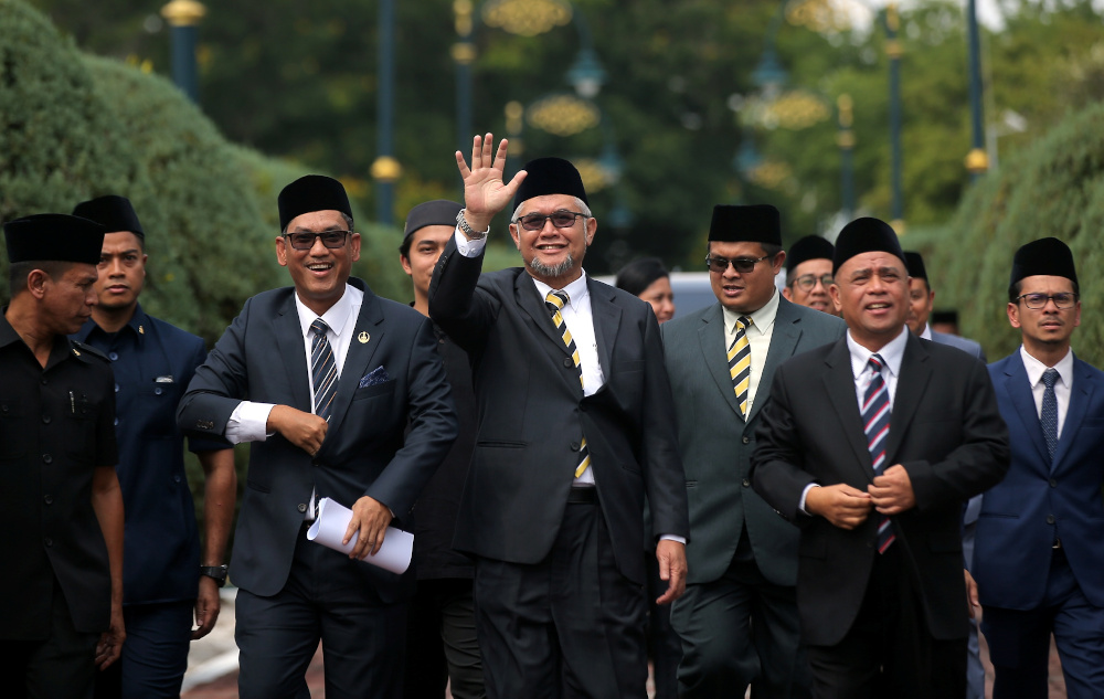 (From left) Datuk Seri Ahmad Faizal Azumu, Razman Zakaria and Datuk Saarani Mohamad leave Istana Kinta after an audience with the Sultan of Perak Sultan Nazrin Muizzuddin Shah March 12, 2020. u00e2u20acu201d Picture by Farhan Najib