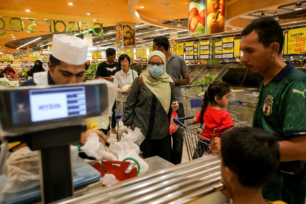 People are seen shopping for groceries and other essentials at Mydin Meru Raya in Ipoh March 16, 2020. u00e2u20acu201d Picture by Farhan Najib