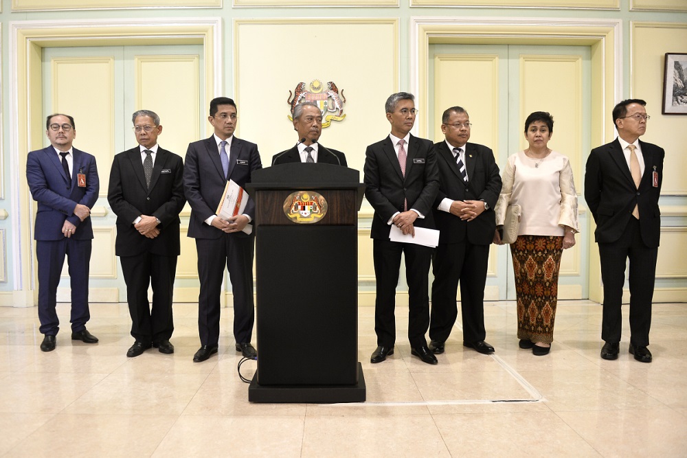 Prime Minister Tan Sri Muhyiddin Yasin (fourth left) at a press conference in Putrajaya March 16, 2020. u00e2u20acu201d Picture by Miera Zulyana