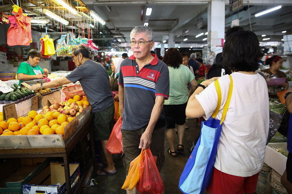 People shopping at the SS15 wet market in Subang Jaya March 18, 2020. u00e2u20acu201d Picture by Yusof Mat Isa