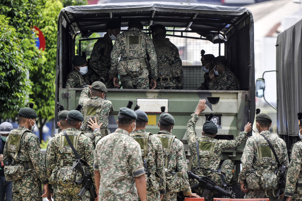 Malaysian Armed Forces being deployed to help the police enforce the movement control order in Kuala Lumpur, March 22, 2020. u00e2u20acu201d Picture by Shafwan Zaidon