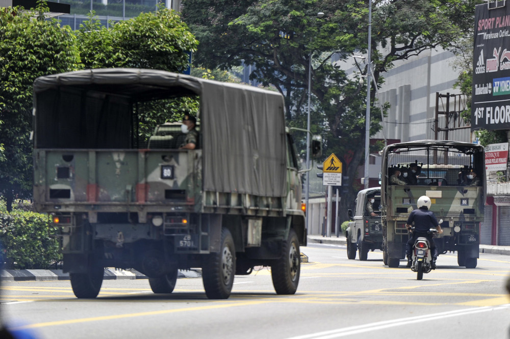 Malaysian Armed Forces being deployed to help the police enforce the movement control order in Kuala Lumpur, March 22, 2020. u00e2u20acu201d Picture by Shafwan Zaidon