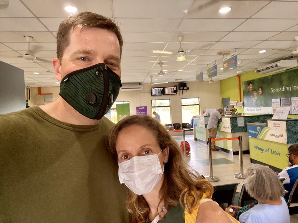 Jason Hassenstab and wife Margaret wearing face masks at the Lahad Datu airport in Sabah. u00c2u00acu00e2u20acu201d Picture via Twitter/Jason Hassenstab