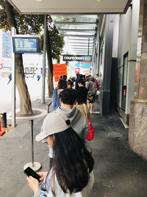 Queue outside Countdown Auckland Victoria Street West: customers stocking up for the impending level 4 period. — Picture by CK Lim