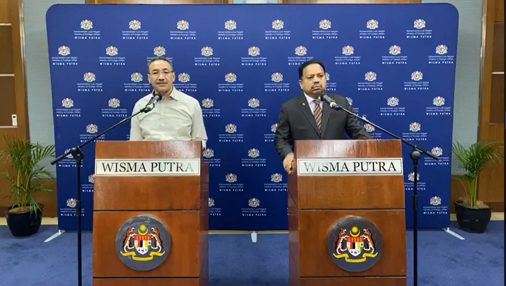Foreign Minister Datuk Seri Hishammuddin Hussein (left) and MIC president Senator Tan Sri SA Vigneswaran during a press conference in Putrajaya March 24, 2020. u00e2u20acu201d Screen capture via Facebook/Hishammuddin Hussein